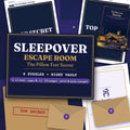 Sleepover Escape Room: The Pillow Fort Secret – flat lay of printed pages on a starry duvet: the cover, the certificate, two numbered envelopes and puzzle pages covered by a TOP SECRET label; title and ‘2–12 kids · ages 8–12 · 25 pages · print & play tonight’